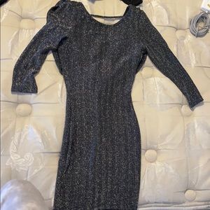 Tight black shiny dress